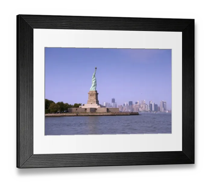 Framed Print : View of Statue of Liberty, with Manhattan Island city skyline in distance, Liberty Island, New York Harbor Framed Print : View of Statue of Liberty, with Manhattan Island city skyline in distance, Liberty Island, New York Harbor
