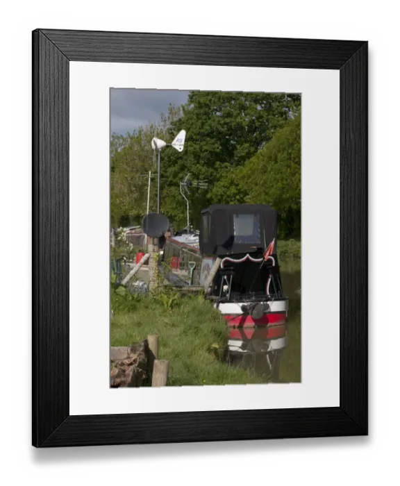 Framed Print : Small wind turbine on narrowboat, supplying energy to domestic items, Oxfordshire, England, may