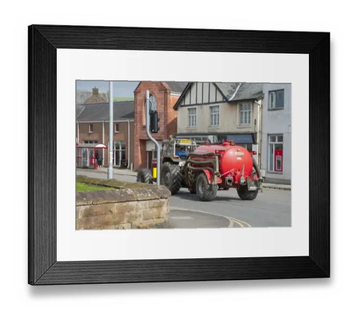 Framed Print : Tractor with slurry tanker, travelling through town, Lockerbie, Dumfries and Galloway, Scotland, march Framed Print : Tractor with slurry tanker, travelling through town, Lockerbie, Dumfries and Galloway, Scotland, march