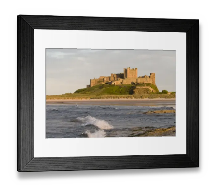 Framed Print : View across beach and sea towards castle, Bamburgh Castle, Northumberland, England, may Framed Print : View across beach and sea towards castle, Bamburgh Castle, Northumberland, England, may