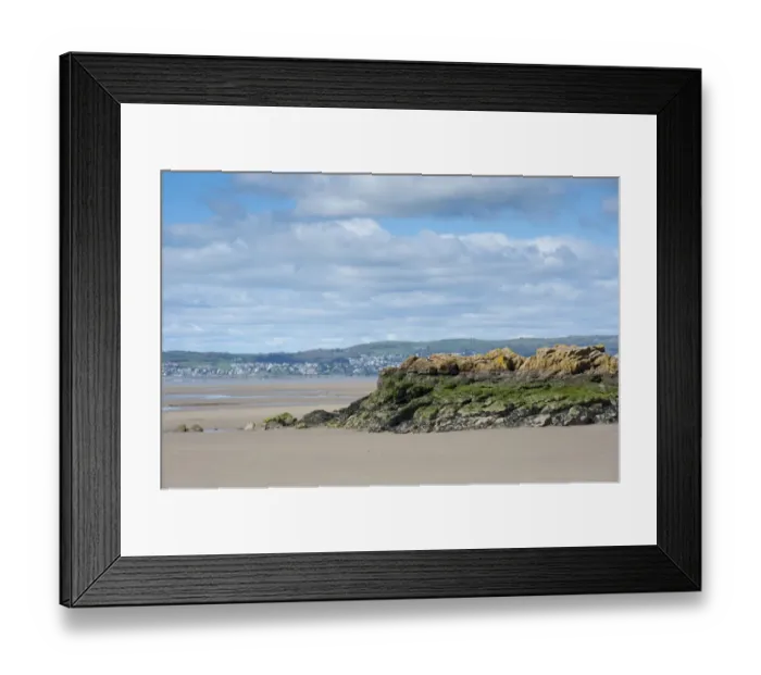 Framed Print : View of coast with rocky outcrop at low tide, looking towards Grange-over-sands, Silverdale, Morecambe Bay, Lancashire