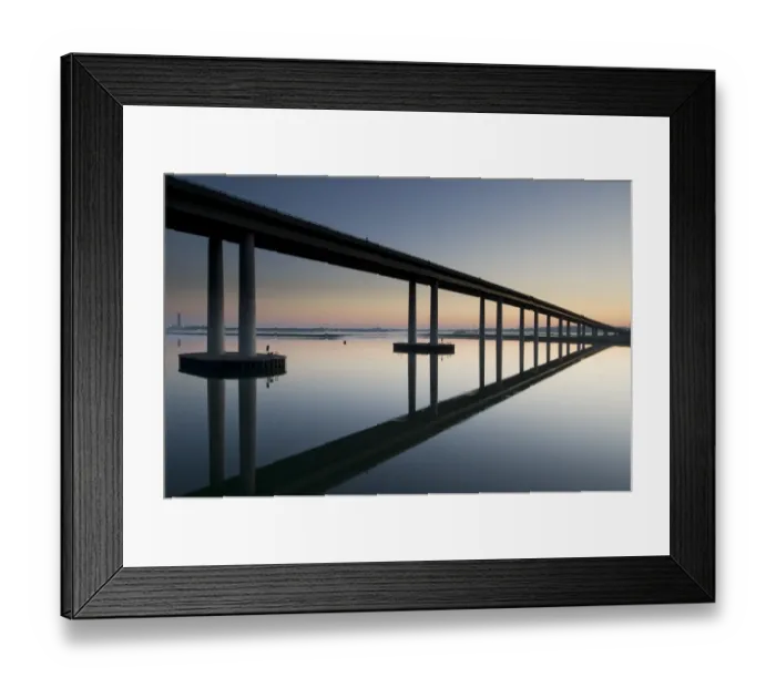 Framed Print : View of bridge reflected in estuary at dawn, Sheppey Crossing, The Swale Estuary, Isle of Sheppey, Kent, England, July Framed Print : View of bridge reflected in estuary at dawn, Sheppey Crossing, The Swale Estuary, Isle of Sheppey, Kent, England, July