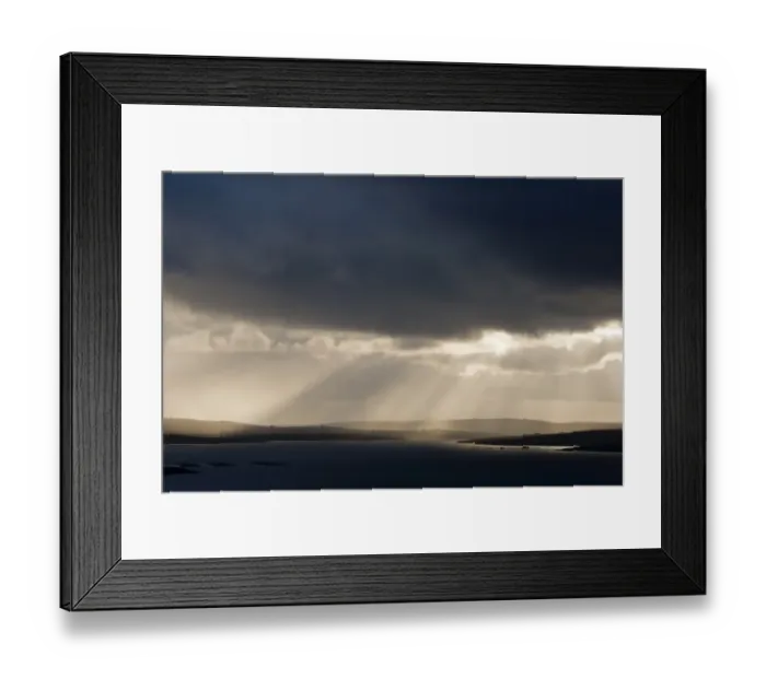 Framed Print : Stormy evening sky with sunbeams over coastline, looking towards Yell, Fetlar, Shetland Islands, Scotland, June Framed Print : Stormy evening sky with sunbeams over coastline, looking towards Yell, Fetlar, Shetland Islands, Scotland, June