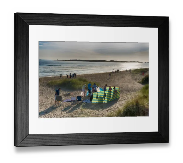 Framed Print : Holidaymakers and windbreak on beach, Newborough, Anglesey, Wales, August Framed Print : Holidaymakers and windbreak on beach, Newborough, Anglesey, Wales, August