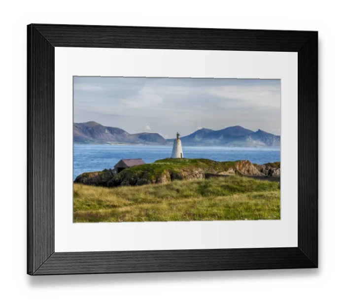 Framed Print : View of lighthouse and coastline on tidal island, Llanddwyn Island, Newborough Warren National Nature Reserve Framed Print : View of lighthouse and coastline on tidal island, Llanddwyn Island, Newborough Warren National Nature Reserve