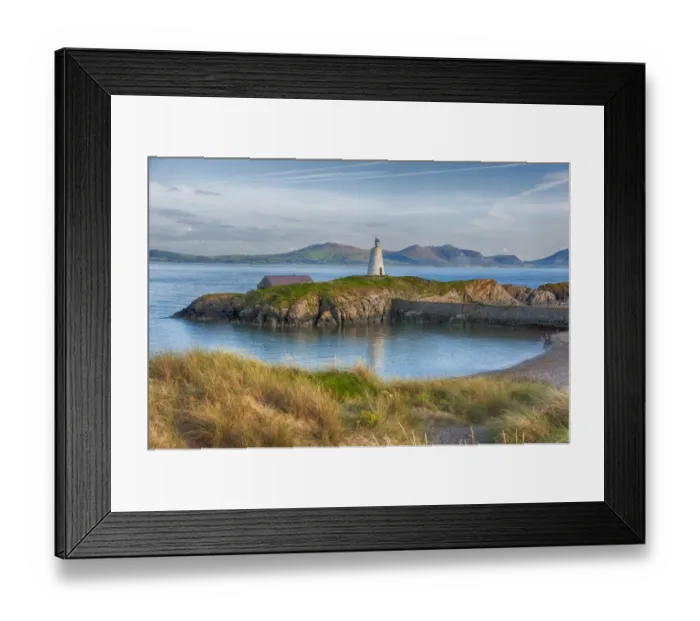 Framed Print : View of lighthouse and coastline on tidal island, Llanddwyn Island, Newborough Warren National Nature Reserve Framed Print : View of lighthouse and coastline on tidal island, Llanddwyn Island, Newborough Warren National Nature Reserve