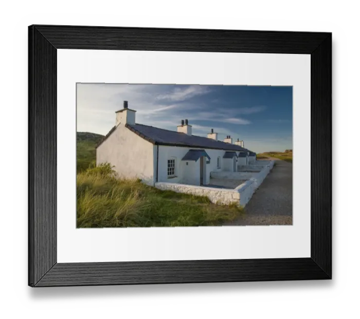 Framed Print : Pilot cottages used to service pilot boats and lifeboats on tidal island, Llanddwyn Island Framed Print : Pilot cottages used to service pilot boats and lifeboats on tidal island, Llanddwyn Island