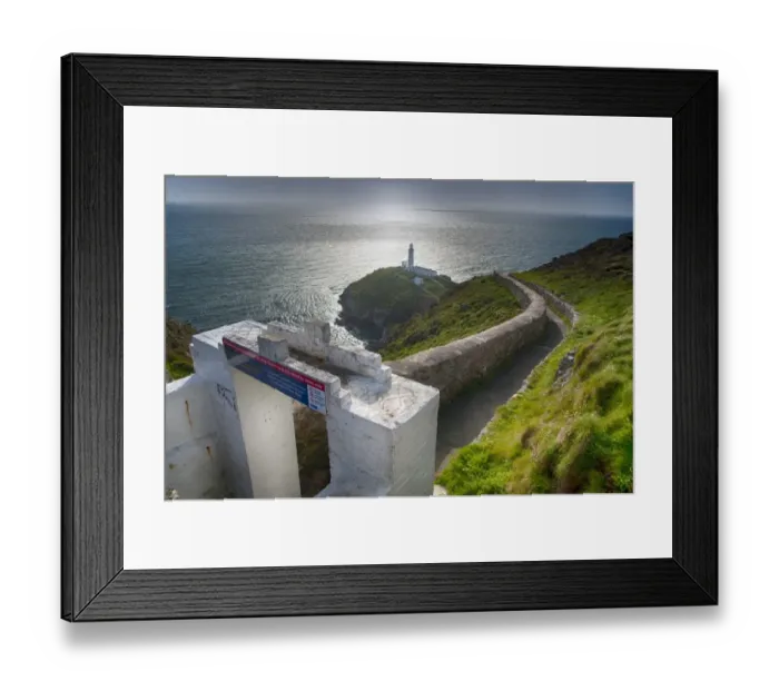 Framed Print : View of coastline and lighthouse, South Stack Lighthouse, Holyhead, Holy Island, Anglesey, Wales, August Framed Print : View of coastline and lighthouse, South Stack Lighthouse, Holyhead, Holy Island, Anglesey, Wales, August