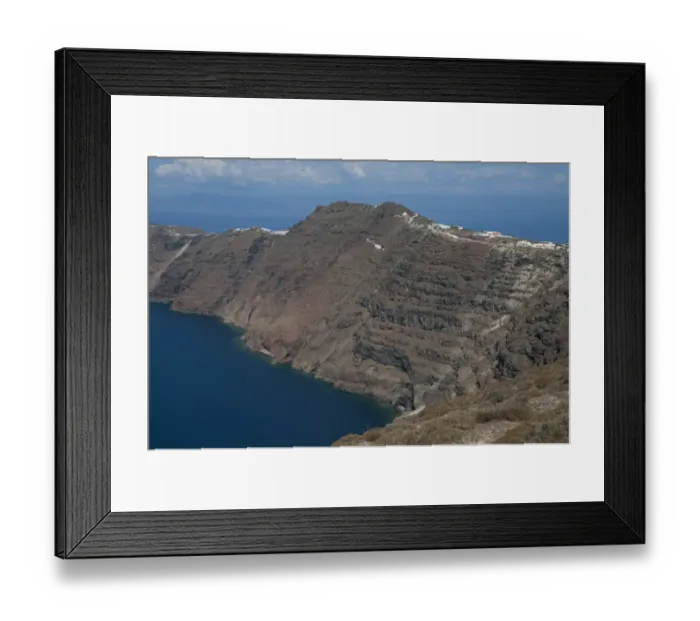 Framed Print : Rugged coastline with volcanic cliffs, near Oia, Santorini, Cyclades, Aegean Sea, Greece, September Framed Print : Rugged coastline with volcanic cliffs, near Oia, Santorini, Cyclades, Aegean Sea, Greece, September