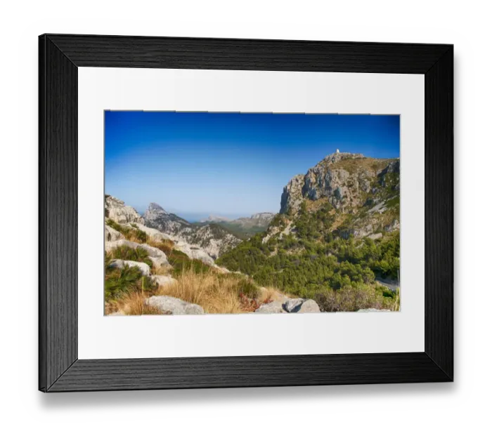 Framed Print : View of coastal landscape and old watchtower, viewed from Punta de la Nao, Cap de Formentor, Formentor Peninsula Framed Print : View of coastal landscape and old watchtower, viewed from Punta de la Nao, Cap de Formentor, Formentor Peninsula