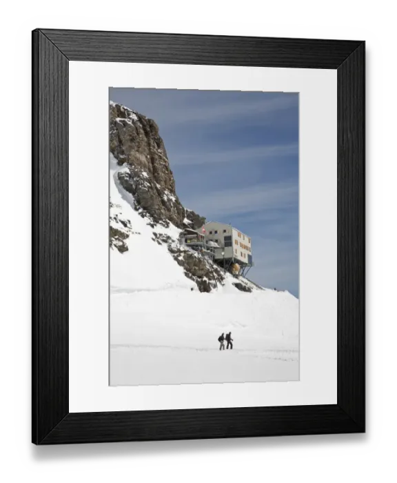 Framed Print : Walkers walking on snow covered mountain below mountain hut, Monchsjoch Hut, Jungfraujoch, Bernese Alps, Switzerland Framed Print : Walkers walking on snow covered mountain below mountain hut, Monchsjoch Hut, Jungfraujoch, Bernese Alps, Switzerland