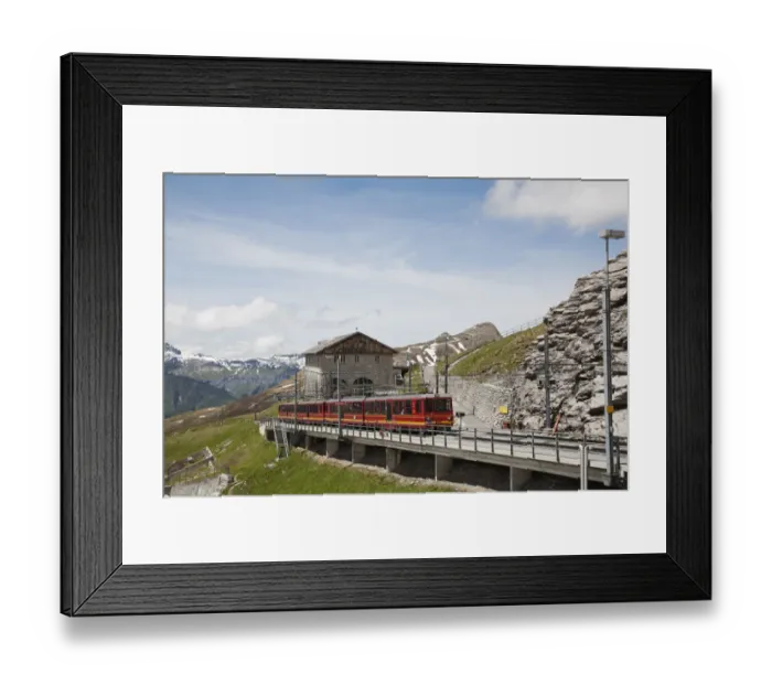 Framed Print : Jungfraubahn train at Eigergletscher Station, Bernese Alps, Switzerland, June Framed Print : Jungfraubahn train at Eigergletscher Station, Bernese Alps, Switzerland, June