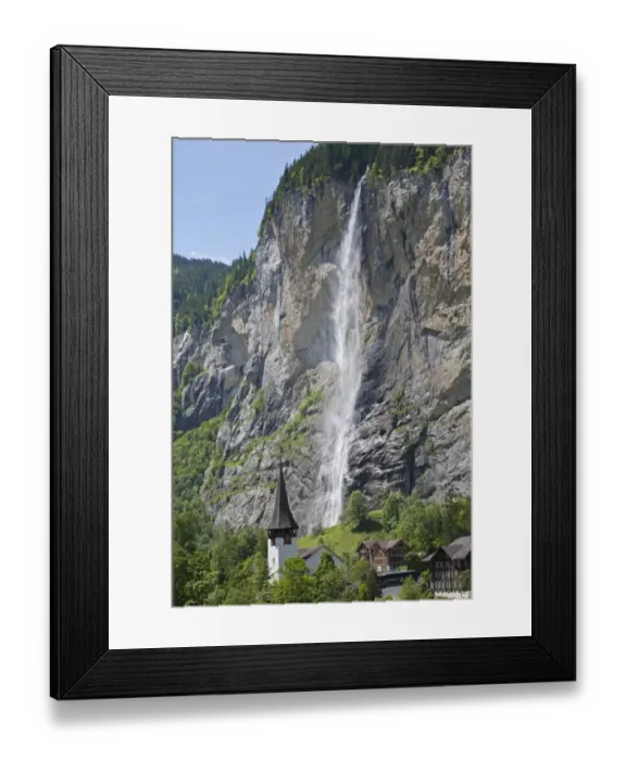 Framed Print : Waterfall flowing over mountain cliff, Staubbach Falls, Lauterbrunnen, Bernese Alps, Switzerland, June