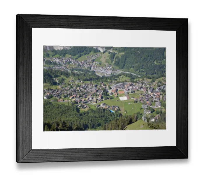 Framed Print : View of village in mountain valley, viewed from Mannlichen, Wengen, Bernese Alps, Switzerland, June Framed Print : View of village in mountain valley, viewed from Mannlichen, Wengen, Bernese Alps, Switzerland, June