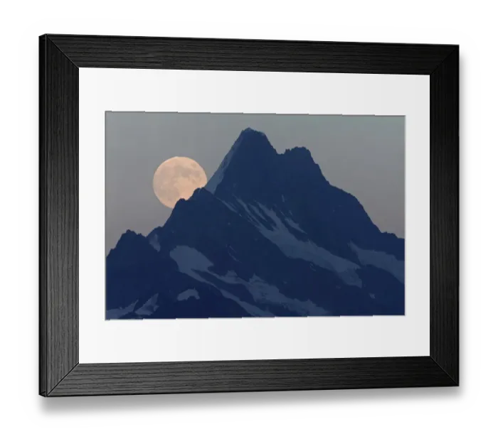 Framed Print : Full Moon rising over mountain peak at dusk, Schreckhorn, Swiss Alps, Bernese Oberland, Switzerland, August