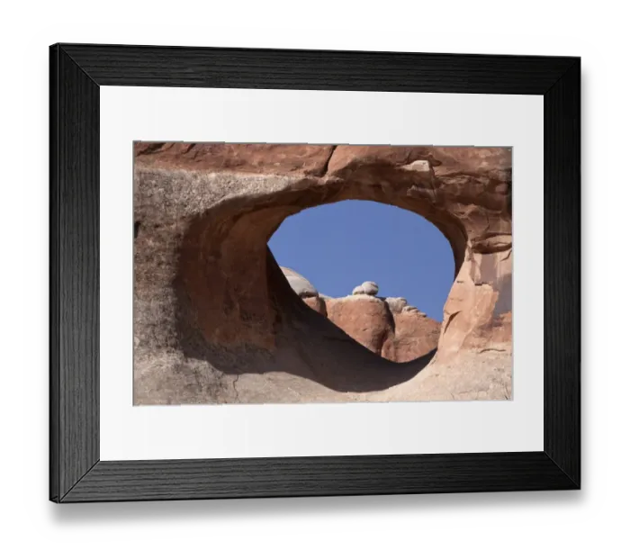 Framed Print : Tunnel Arch in Arches National Park, Utah. This arch is made from Entrada Sandstone which over time is eroded by water Framed Print : Tunnel Arch in Arches National Park, Utah. This arch is made from Entrada Sandstone which over time is eroded by water