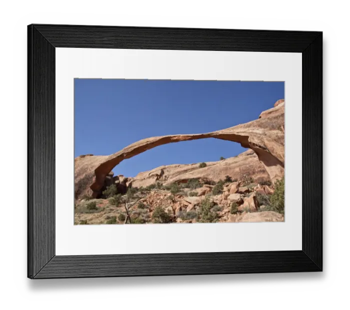 Framed Print : Landscape Arch in Arches National Park, Utah. This arch is made from Entrada Sandstone which over time is eroded by Framed Print : Landscape Arch in Arches National Park, Utah. This arch is made from Entrada Sandstone which over time is eroded by