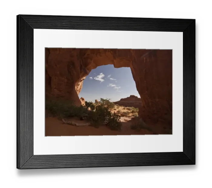 Framed Print : Pine tree Arch in Arches National Park, Utah. This arch is made from Entrada Sandstone which over time is eroded by Framed Print : Pine tree Arch in Arches National Park, Utah. This arch is made from Entrada Sandstone which over time is eroded by