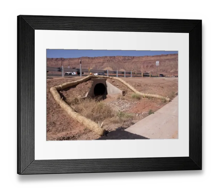 Framed Print : Using rolled straw as a barrier to stop pollutants from entering the water course Framed Print : Using rolled straw as a barrier to stop pollutants from entering the water course