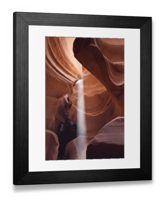 Framed Print : Light beam in Upper Antelope Canyon was formed by erosion of Navajo Sandstone Framed Print : Light beam in Upper Antelope Canyon was formed by erosion of Navajo Sandstone