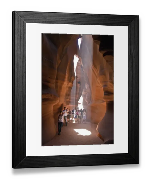 Framed Print : People caught in Light beam in Upper Antelope Canyon was formed by erosion of Navajo Sandstone Framed Print : People caught in Light beam in Upper Antelope Canyon was formed by erosion of Navajo Sandstone