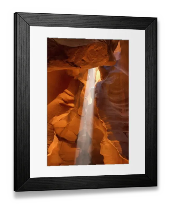 Framed Print : Light beam in Upper Antelope Canyon was formed by erosion of Navajo Sandstone Framed Print : Light beam in Upper Antelope Canyon was formed by erosion of Navajo Sandstone