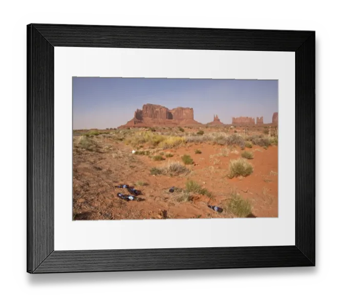 Framed Print : Glass bottle dumped by the side of the road, risk to wildlife and fire. Monument Valley Arizona Framed Print : Glass bottle dumped by the side of the road, risk to wildlife and fire. Monument Valley Arizona
