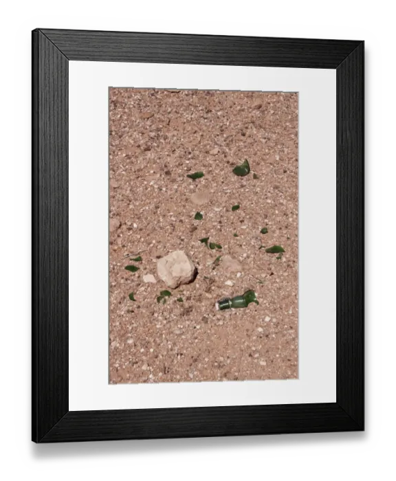 Framed Print : Broken glass bottle dumped by the side of the road, risk to wildlife and fire Framed Print : Broken glass bottle dumped by the side of the road, risk to wildlife and fire