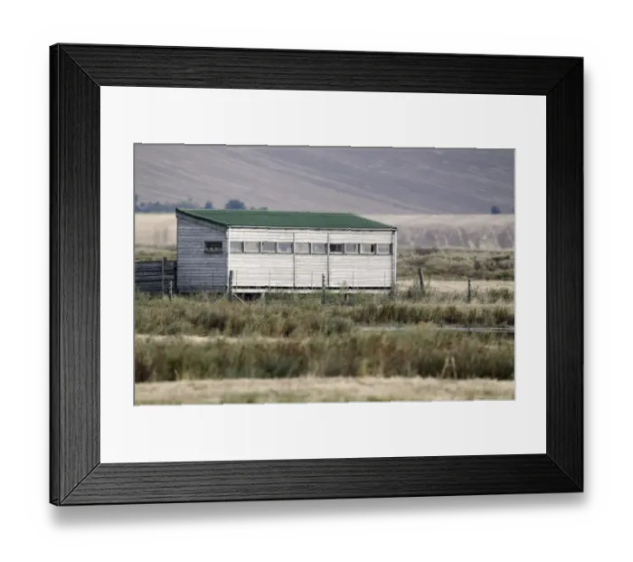 Framed Print : Birdwatching hide overlooking marshland, Elmley Marshes RSPB Reserve, North Kent Marshes, Isle of Sheppey, Kent Framed Print : Birdwatching hide overlooking marshland, Elmley Marshes RSPB Reserve, North Kent Marshes, Isle of Sheppey, Kent