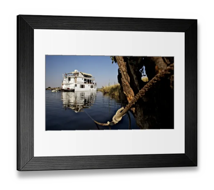 Framed Print : Pride of the Zambezi tourist houseboat, moored on river, Chobe River, Chobe N. P. Botswana, July Framed Print : Pride of the Zambezi tourist houseboat, moored on river, Chobe River, Chobe N. P. Botswana, July