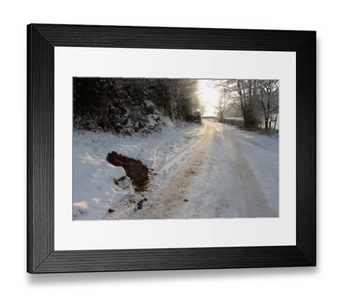 Framed Print : Grit and salt heap left on roadside by council in rural area during snowy conditions, North Wales, december Framed Print : Grit and salt heap left on roadside by council in rural area during snowy conditions, North Wales, december