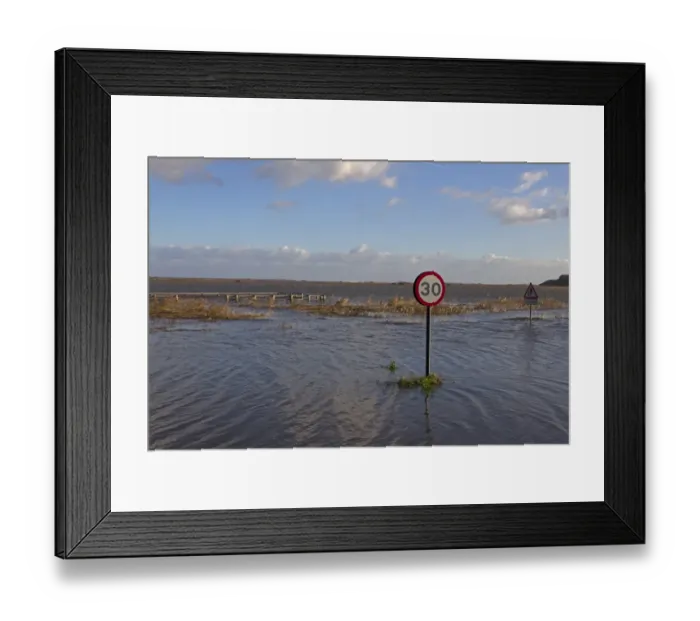Framed Print : Flooded coast road and marshes after tidal surge, Cley-next-the-sea, North Norfolk, England, December 2013 Framed Print : Flooded coast road and marshes after tidal surge, Cley-next-the-sea, North Norfolk, England, December 2013