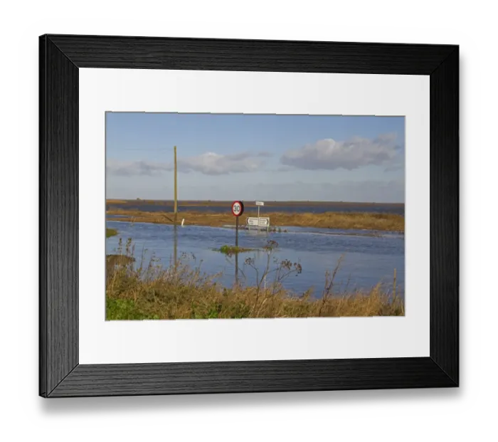 Framed Print : Flooded coast road and marshes after tidal surge, Cley-next-the-sea, North Norfolk, England, December 2013 Framed Print : Flooded coast road and marshes after tidal surge, Cley-next-the-sea, North Norfolk, England, December 2013