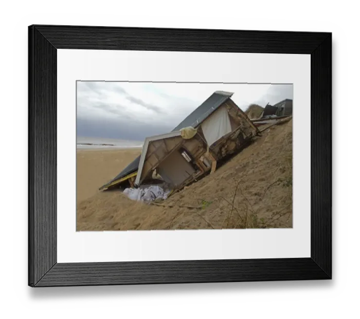 Framed Print : Eroded sea cliffs and damaged chalet after December 2013 tidal surge, Hemsby, Norfolk, England, January Framed Print : Eroded sea cliffs and damaged chalet after December 2013 tidal surge, Hemsby, Norfolk, England, January