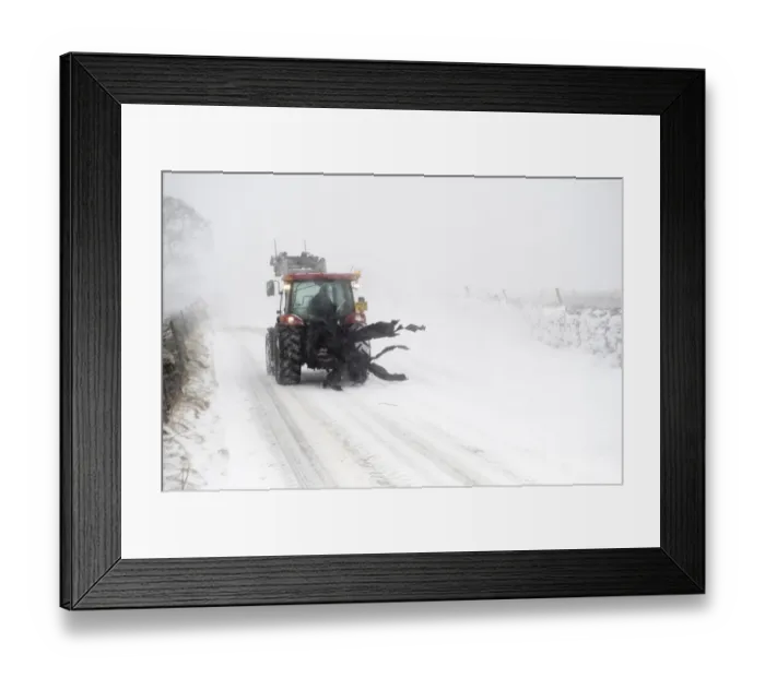 Framed Print : Tractor travelling along rural road during severe snowstorm, A685, near Ravenstonedale, Cumbria, England, March Framed Print : Tractor travelling along rural road during severe snowstorm, A685, near Ravenstonedale, Cumbria, England, March