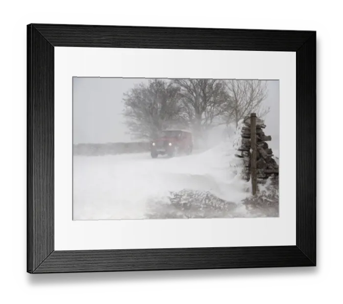 Framed Print : Land Rover travelling along rural road during severe snowstorm, A685, near Ravenstonedale, Cumbria, England, March Framed Print : Land Rover travelling along rural road during severe snowstorm, A685, near Ravenstonedale, Cumbria, England, March