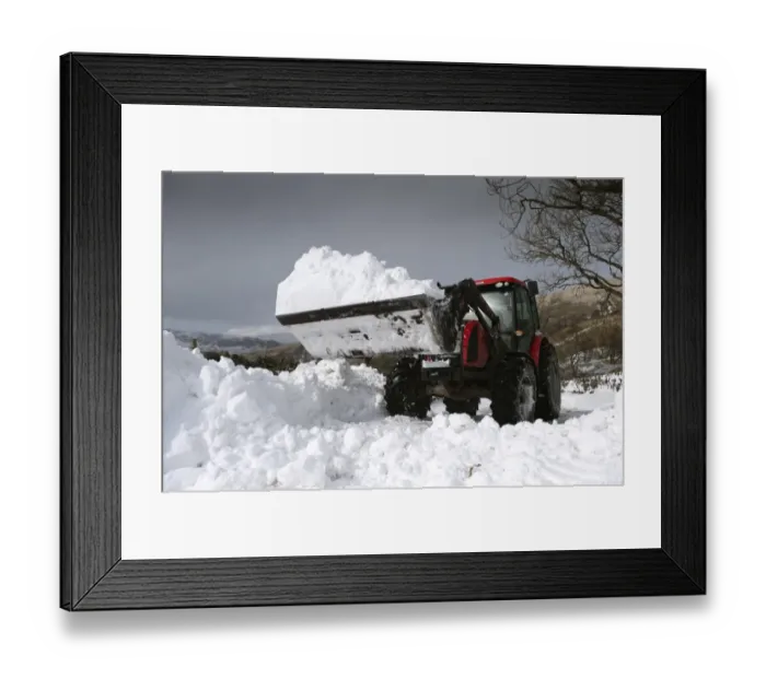 Framed Print : Zetor tractor with loader clearing snow from blocked rural road after snowstorm, Cumbria, England, March Framed Print : Zetor tractor with loader clearing snow from blocked rural road after snowstorm, Cumbria, England, March