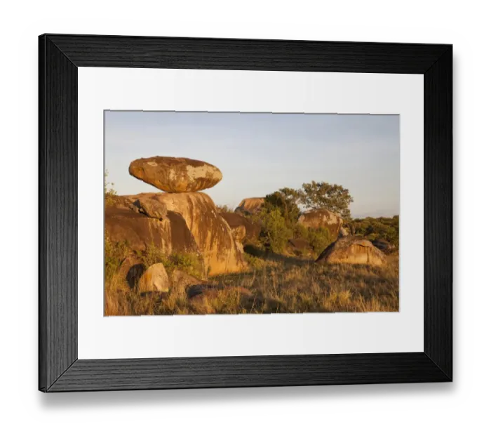 Framed Print : View of savannah with kopje rock formations in dawn sunlight, Serengeti N. P. Tanzania, December Framed Print : View of savannah with kopje rock formations in dawn sunlight, Serengeti N. P. Tanzania, December