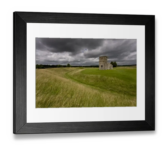 Framed Print : View of ruined Norman / Medieval church built within neolithic henge monument, surrounded by chalk grassland Framed Print : View of ruined Norman / Medieval church built within neolithic henge monument, surrounded by chalk grassland