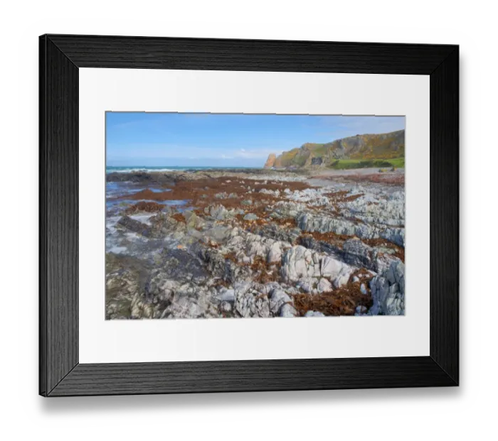Framed Print : Rocky shore and cliffs at low tide, La Pulec, Jersey, Channel Islands, May Framed Print : Rocky shore and cliffs at low tide, La Pulec, Jersey, Channel Islands, May