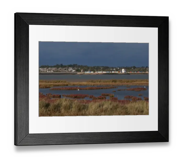 Framed Print : View across saltmarsh and estuary towards coastal town, viewed from East Mersea, Brightlingsea, River Colne, Essex Framed Print : View across saltmarsh and estuary towards coastal town, viewed from East Mersea, Brightlingsea, River Colne, Essex