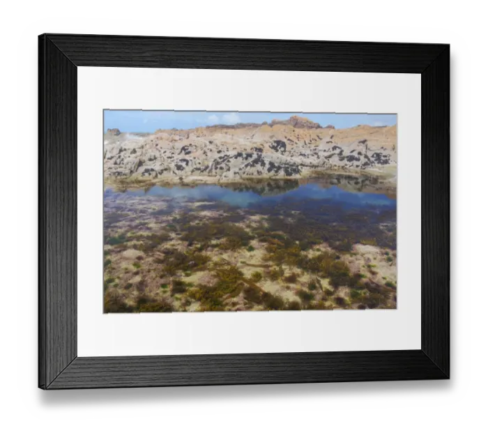 Framed Print : Tidepool on rocky shore at low tide, Jersey, Channel Islands, May