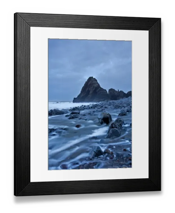 Framed Print : View of beach and rock formation with receeding tide on overcast evening, Blackchurch Rock, Mouthmill Beach Framed Print : View of beach and rock formation with receeding tide on overcast evening, Blackchurch Rock, Mouthmill Beach
