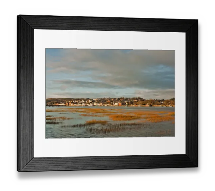 Framed Print : View across estuary with receeding tide towards town on sunny winter morning, River Torridge, Bideford, North Devon