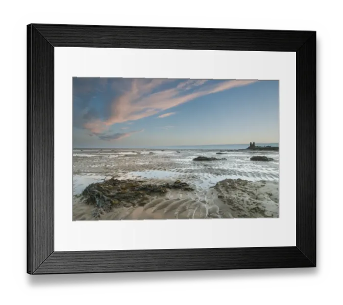 Framed Print : View of seaweed on beach at low tide, with 12th Century ruined church in distance at sunrise, New Years Day, St Framed Print : View of seaweed on beach at low tide, with 12th Century ruined church in distance at sunrise, New Years Day, St