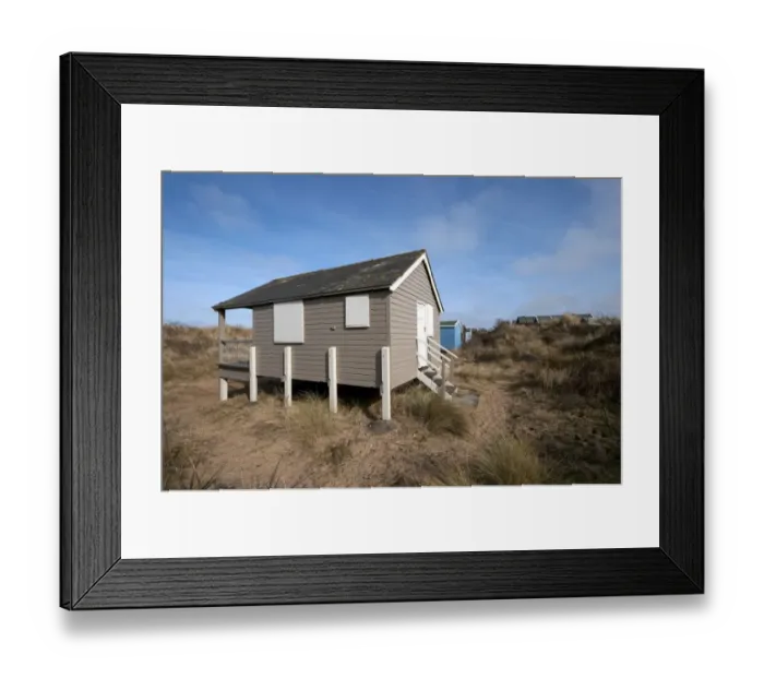 Framed Print : Raised beach hut in coastal sand dunes, Hunstanton, Norfolk, England, February Framed Print : Raised beach hut in coastal sand dunes, Hunstanton, Norfolk, England, February