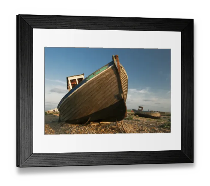 Framed Print : Abandoned fishing boats on shingle beach, Dungeness, Kent, England, June Framed Print : Abandoned fishing boats on shingle beach, Dungeness, Kent, England, June