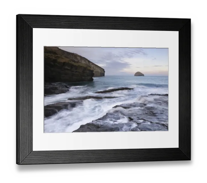 Framed Print : View of tide rushing in over coastal rocks at sunrise, with Gull Rock just off headland at Dennis Point in distance Framed Print : View of tide rushing in over coastal rocks at sunrise, with Gull Rock just off headland at Dennis Point in distance