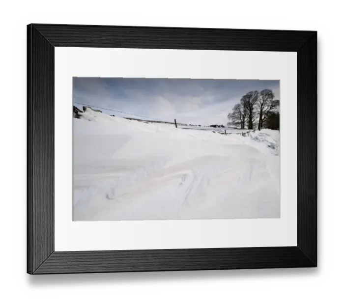 Framed Print : Patterns in snowdrift at back of drystone wall after snowstorm, Cumbria, England, March Framed Print : Patterns in snowdrift at back of drystone wall after snowstorm, Cumbria, England, March