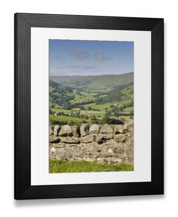 Framed Print : View over drystone wall across river valley with farmland, looking up Swaledale towards Gunnerside from Whitaside Moor